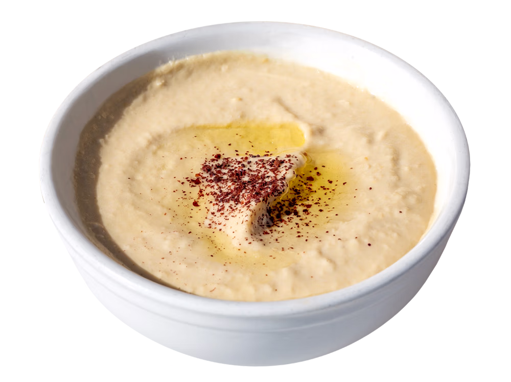 Hummus from Sultan's Market. A smooth blend of chickpeas, tahini, olive oil, garlic, lemon juice, and sea salt, topped with olive oil and served with pita.